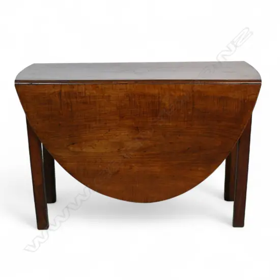 An English c.1770 oval flame mahogany drop leaf table,